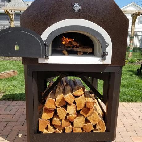 High-quality wood-fired pizza oven outdoors, baking a crispy, artisan pizza over an open flame.
