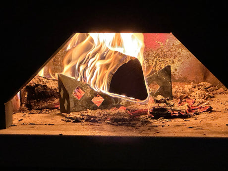 Chicago Brick Ovens Steel Log Holder In CBO Oven Under Fire - In Use