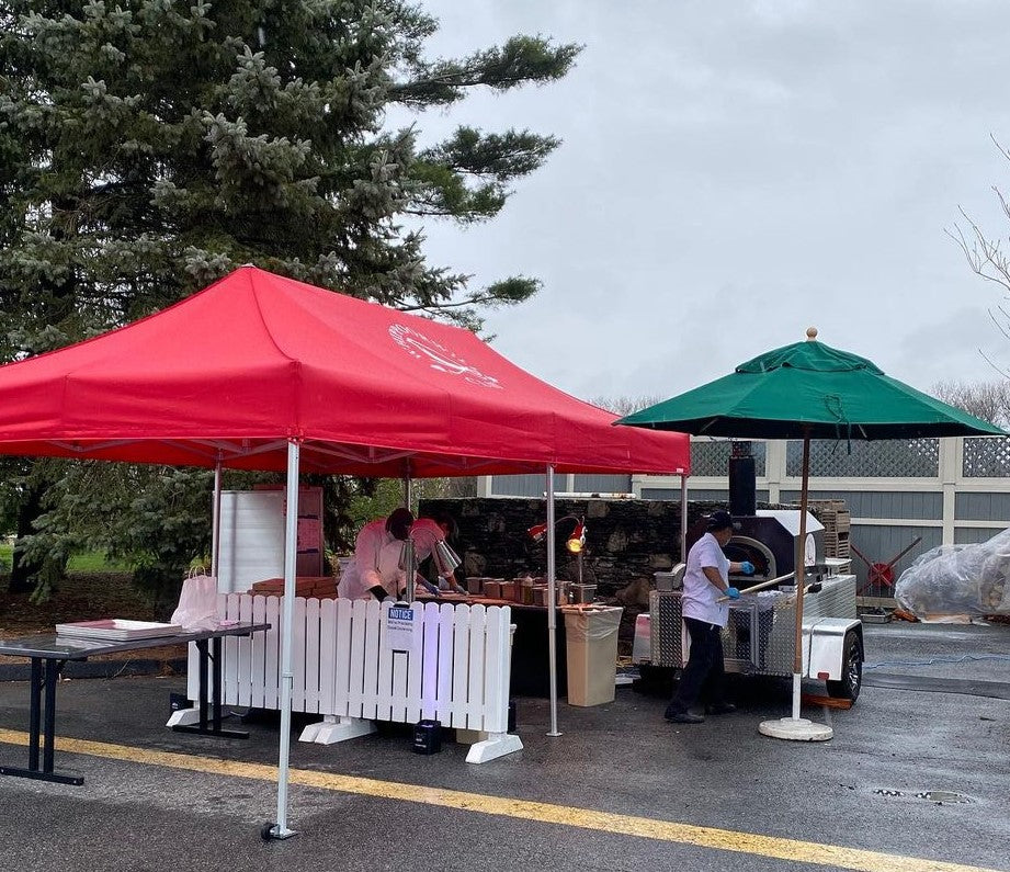 CBO-750 Tailgater Wood Fired Mobile Pizza Oven in Parking Lot 